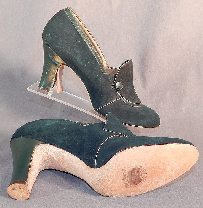 Vintage Art Deco Dark Green Suede Leather Button Trim Unworn Shoes
These lovely ladies shoes have a slipper slip on style with wide shoe tongues, green button trim front instep vamps and green leather covered modified boulevard high heels. 