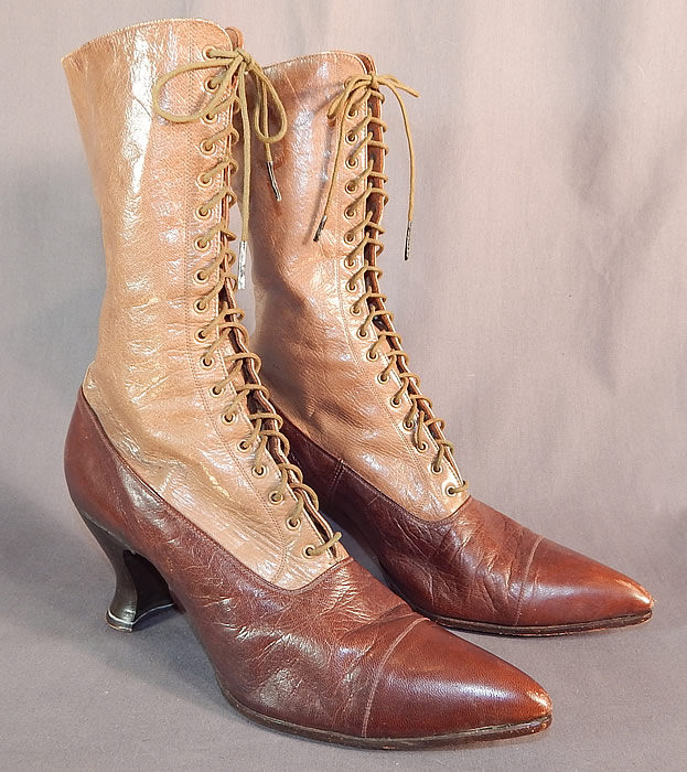 Victorian Antique Brown Two Tone Leather High Top Lace-up Boots Shoes
This pair of antique Victorian era brown two tone leather high top lace-up boots shoes dates from 1900.