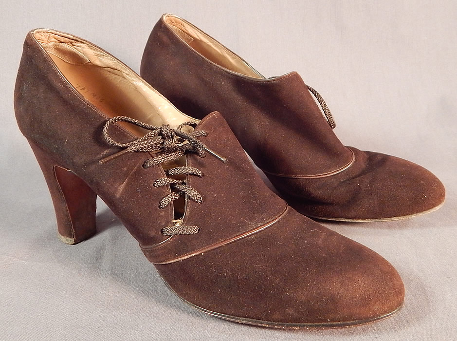 Vintage Marquise Footwear Brown Suede Leather Side Lacing Trim Art Deco Shoes
This pair of vintage Marquise Footwear brown suede leather side lacing trim Art deco shoes date from the 1930s.