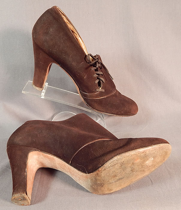 Vintage Marquise Footwear Brown Suede Leather Side Lacing Trim Art Deco Shoes
These lovely ladies day shoes have decorative side lacing with the original brown shoe string laces, rounded toes and brown suede leather covered modified boulevard high heels. 