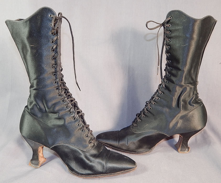 Victorian Vintage Oppenheim Collins & Co. Black Silk Satin High Top Lace-up Boots
This pair of vintage Oppenheim Collins & Co. Victorian era antique black silk satin high top lace-up boots dates from 1900.