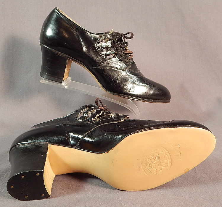 Unworn Vintage Anna Walker Arch Joy Cutout Straps Black Leather Laceup Shoes
The shoes measure 9 inches long, 2 1/2 inches wide, with 2 inch high heels. They are in good unworn condition and have some slight crazing on the leather from storage. These are truly a wonderful piece of wearable quality made shoe art! 