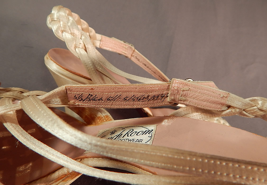 Vintage Chandlers French Room Silk Braided Woven Strap Bridal Wedding Shoes
The shoes measure 9 inches long, 3 inches wide, with 2 inch high heels and are stamped inside a size 5 1/2 B/AA. They are in good condition and look to have been barely worn. These are truly a wonderful piece of wearable shoe art! 