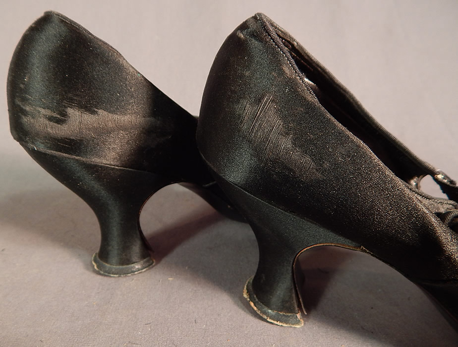 Edwardian Vintage Gundlach's Black Silk Beaded Button Strap Mary Jane Shoes
The shoes are in fair as-is condition, with only some wear, frayed scuffs on the toes, side back heels and the straps have been cut with added elastic bands to be made larger across the instep (see close-ups). These are truly beautiful quality made shoe! 