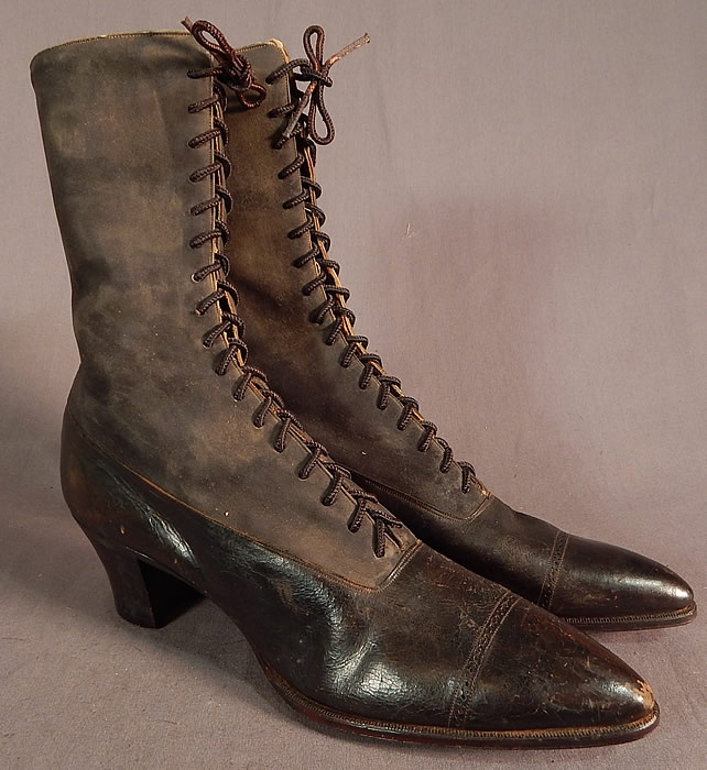 Victorian T.E. Mosely Co Gray Suede Black Leather High Top Lace-up Boots Shoes
This pair of antique Victorian era T.E. Mosely Co. gray suede black leather high top lace-up boots shoes dates from 1900. 
