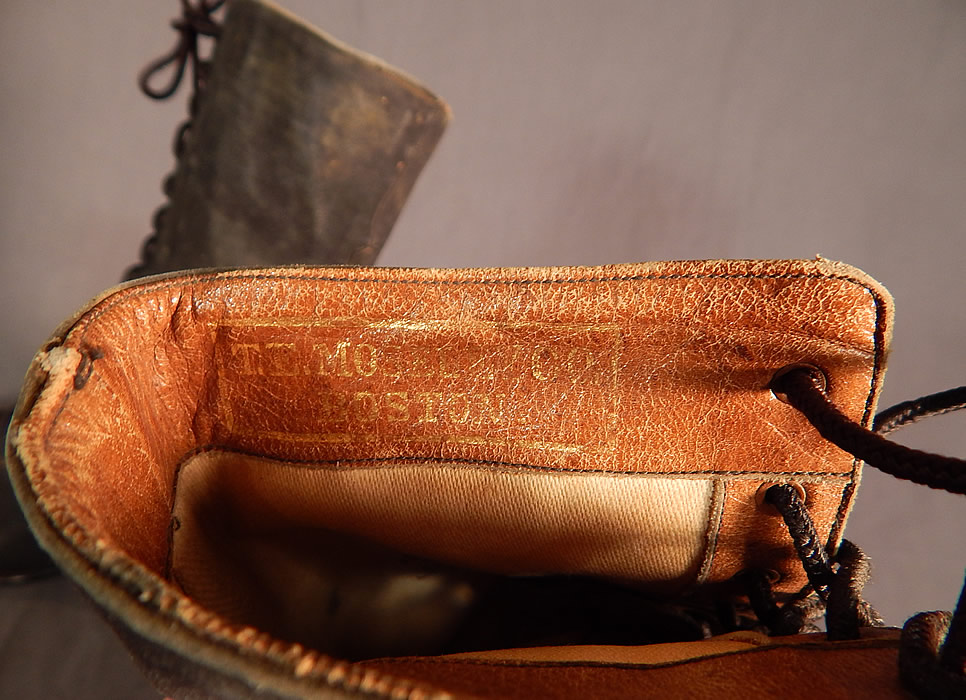 Victorian T.E. Mosely Co Gray Suede Black Leather High Top Lace-up Boots Shoes
They are stamped inside the leather trimmed tops "T.E. Mosely Co. Boston" in gold embossed lettering and marked a size 6 1/2 AA. 
