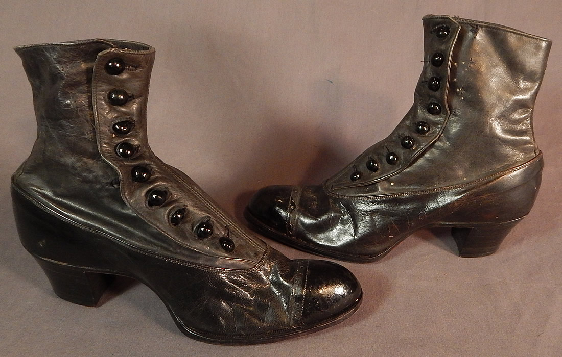 Victorian May Blossom Black Gray Two Tone Leather High Top Button Boots Shoes
These beautiful boots have rounded toes with decorative punchwork designs, the original 9 black shoe buttons for closure and stacked wooden cube heels. 
