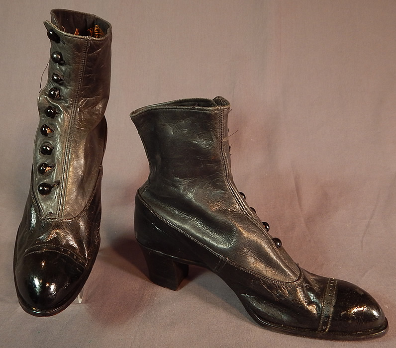 Victorian May Blossom Black Gray Two Tone Leather High Top Button Boots Shoes
The boots measure 7 inches tall, 9 1/2 inches long, 3 inches wide, with 1 1/2 inch high heels and are approximately a size 6 narrow width. 