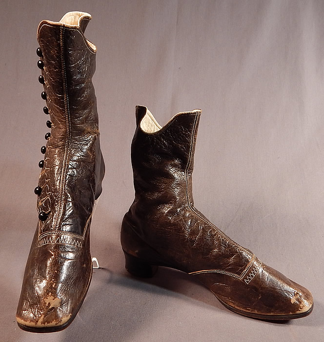 Victorian Brown Leather White Stitching Scalloped High Top Button Boots Shoes
The boots measure 9 inches tall, 9 1/2 inches long, 2 1/2 inches wide, with 1 inch high heels.