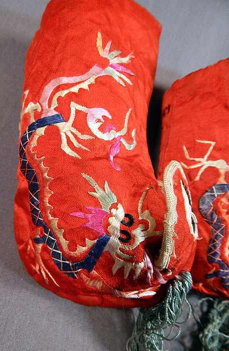 Antique Chinese Child's Red Silk Embroidered Dragon Baby Booties Boots Shoes
Dragon shoes were used to frighten off evil spirits and to help a toddler learn how to walk. They were used as a protective symbol to attempt to ward off the high mortality rates. These precious long baby booties boot style shoes have red silk soft bottom soles and are fully lined in a red and white gingham check cotton fabric inside.