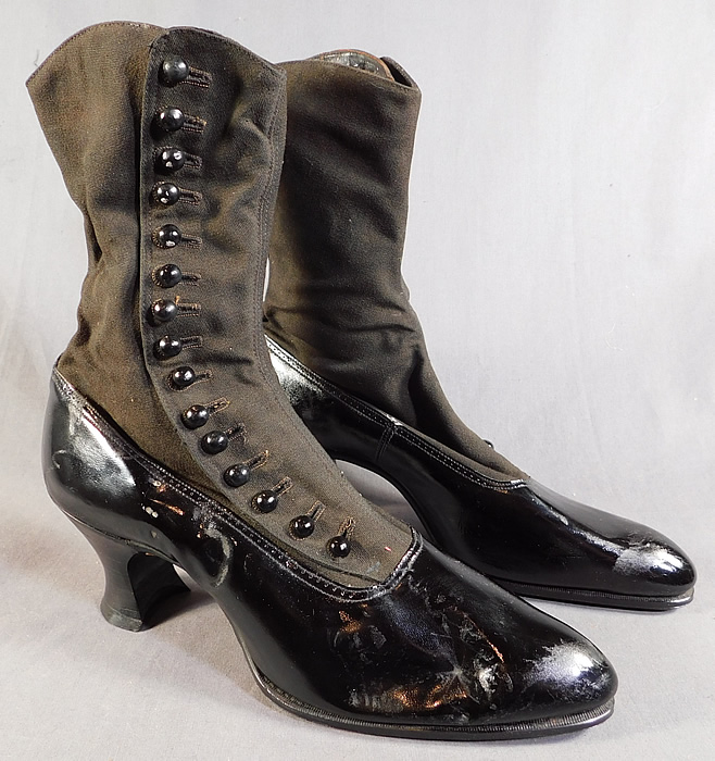 Edwardian Unworn Womens Black Wool Patent Leather High Top Button Boots
These beautiful boots have pointed toes, 15 black shoe buttons along the side for closure and stacked black wooden French spool heels. 
