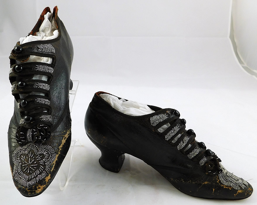 Victorian Antique Brown Leather Steel Cut Beaded 5 Button Strap Shoes
This pair of antique Victorian era brown leather steel cut beaded five button strap shoes date from 1800. 