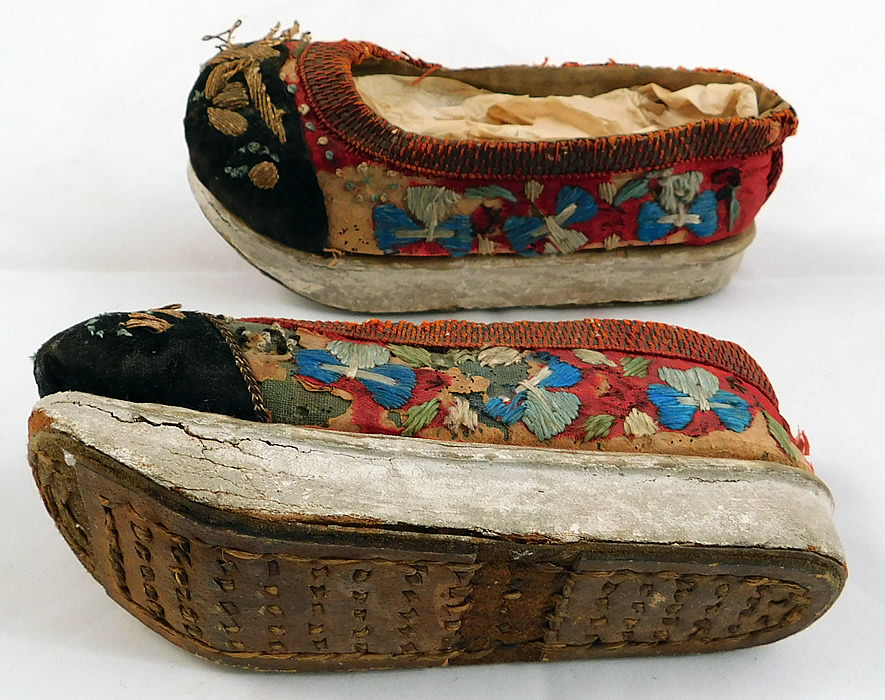 Antique 19th Century Chinese Silk Embroidered Childs Wedge Pedestal Boat Shape Shoes
They are in fair as-is condition, with frayed missing pieces of red silk fabric, loose missing embroidery work stitching and fraying along the top edging trim (see close-ups).