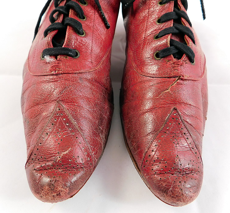 Victorian Rosenbloom Maker Red Leather Pointed Toe Low Lace-up Shoes
The shoes measure 9 1/2 inches long, 2 1/2 inches wide and have a 1 1/2 inch high heel.