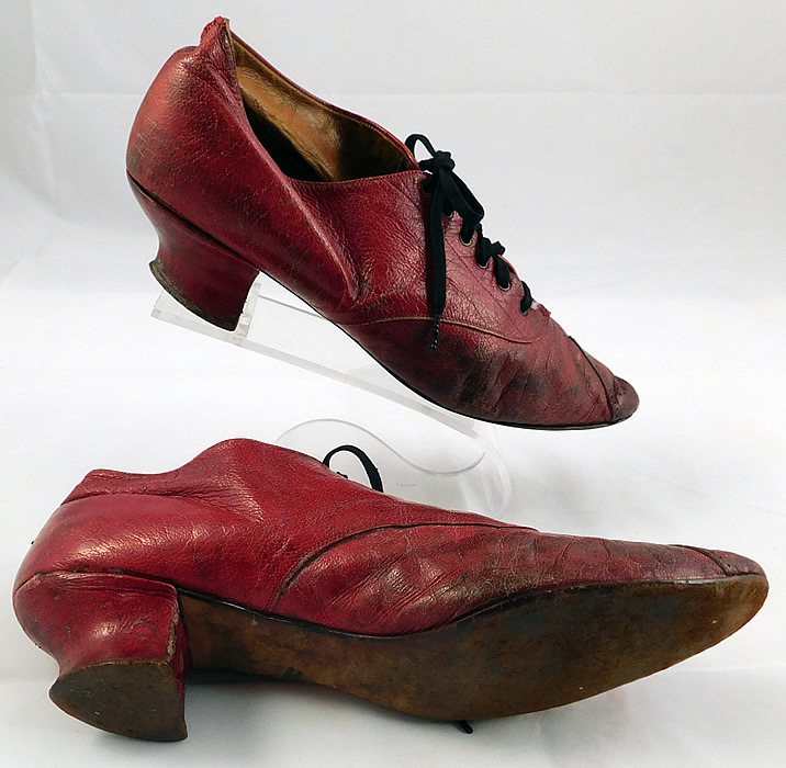 Victorian Rosenbloom Maker Red Leather Pointed Toe Low Lace-up Shoes
This pair of antique Victorian era Rosenbloom Maker red leather pointed toe low lace-up shoes date from 1870.
