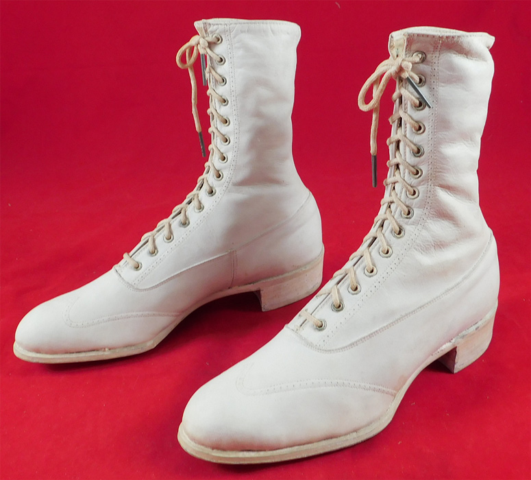 Unworn Edwardian White Leather High Top Rubber Sole Sneaker Boots Shoes
This pair of unworn Edwardian white leather high top rubber sole sneaker boots shoes date from 1915.