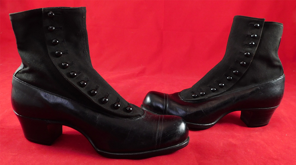Unworn Edwardian Black Wool Cloth Leather Button Boots & Shoe Box
The boots measure 6 1/2 inches tall, 9 inches long, 2 3/4 inches wide, with a 1 1/2 inch high heel and are approximately US size 6.