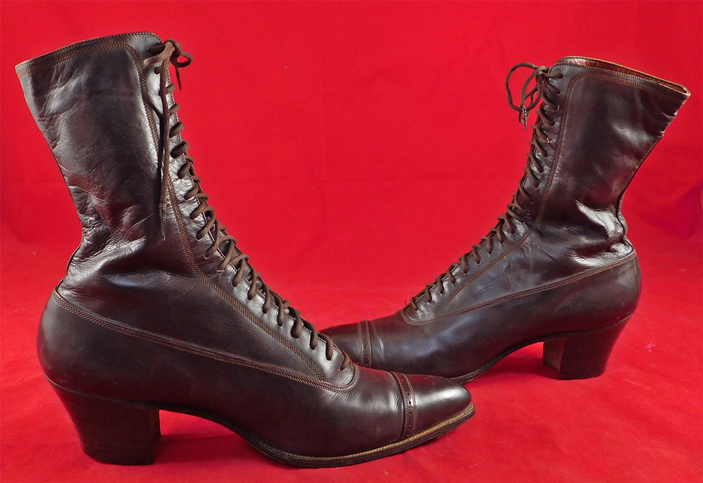 Victorian Unworn Poehlman Shoe Co. Brown Leather High Top Lace-up Boots
These beautiful boots have pointed toes, the original brown shoe string laces for closure and stacked wooden cube heels.