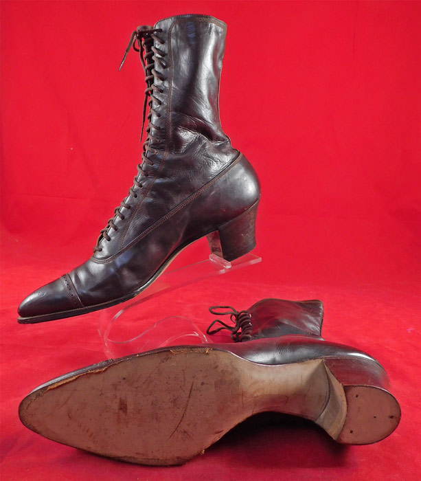 Victorian Unworn Poehlman Shoe Co. Brown Leather High Top Lace-up Boots
The boots measure 9 inches tall, 10 inches long, 2 3/4 inches wide, with 2 inch high heels.