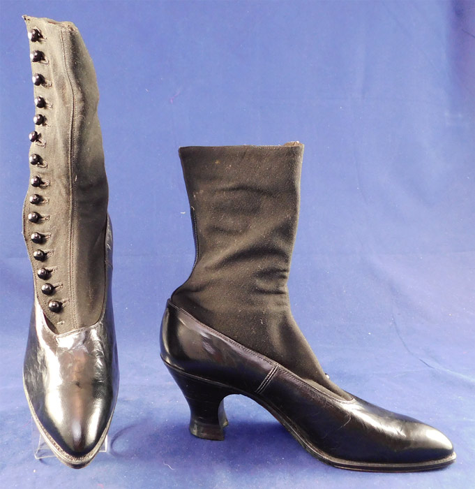 Unworn Edwardian Black Cloth Top Kid Leather Button Boots & Spiderweb Shoe Box
These womens beautiful black boots have pointed toes, 15 black shoe buttons along the side for closure and black stacked wooden French spool heels. They come in the original shoe box covered with a decorative blue silver foil spiderweb graphic print paper from "The Harris Shoe Store" in Dover, New Jersey and are stamped on the outside of the box a European size 36. 