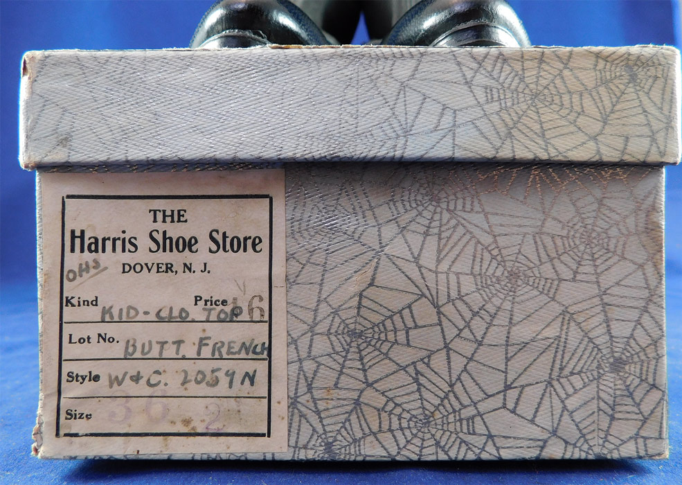 Unworn Edwardian Black Cloth Top Kid Leather Button Boots & Spiderweb Shoe Box
The shoe box has some wear, water spots on the outer cardboard paper and the boots are in excellent wearable condition. These are truly a wonderful piece of quality made wearable shoe art!
