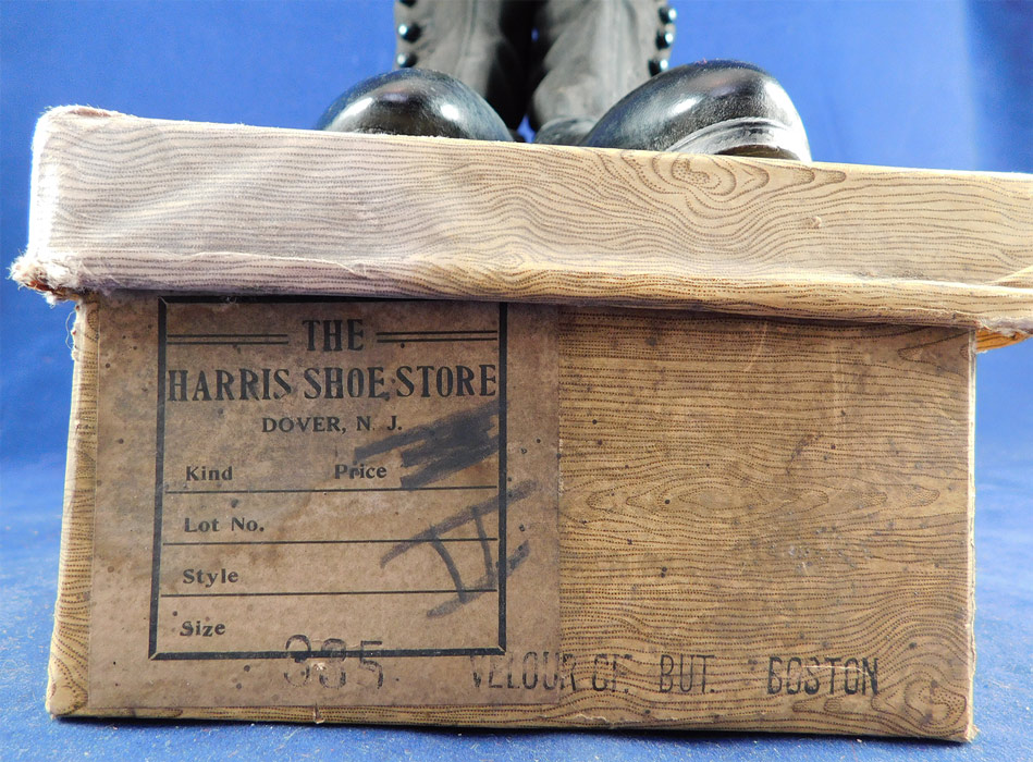 Unworn Edwardian Black Cloth Top Kid Leather High Button Boots & Shoe Box
The shoe box has some wear on the outer cardboard paper and the boots are in good wearable condition, with only some scratches from storage. These are truly a wonderful piece of quality made wearable shoe art!