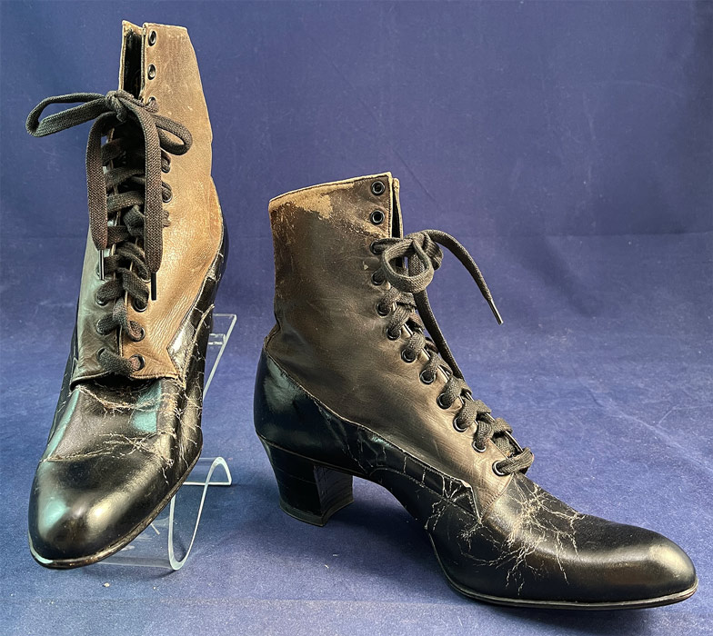 Vintage The Hennessy Shoe Co. Unworn Black & Gray Leather Lace-up Boots
This pair of antique Edwardian era vintage The Hennessy Shoe Co. unworn black and gray leather lace-up boots date from 1905. They are made of a two tone gray leather upper boot and black leather bottom shoe. 