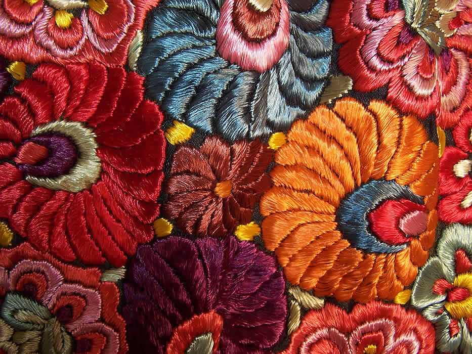 Matyo Hungarian Folk Embroidery Colorful Floral Fringe Round Tablecloth Close up.