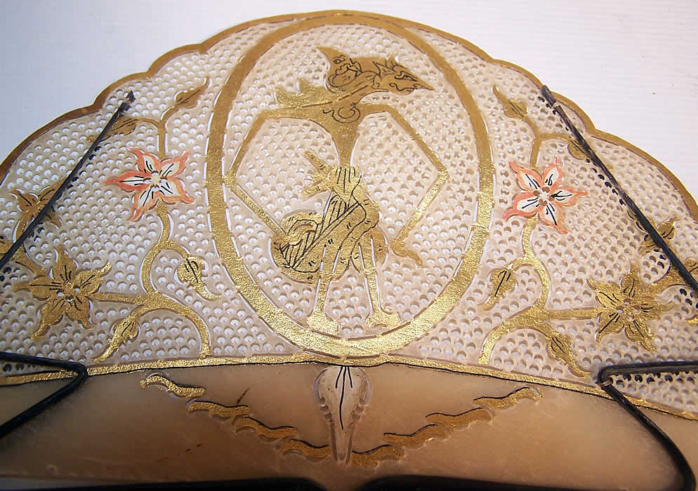 Antique Indonesia Java Wayang Puppet Vellum Gold Leaf Pierced Fixed Fan white and gold one close up.