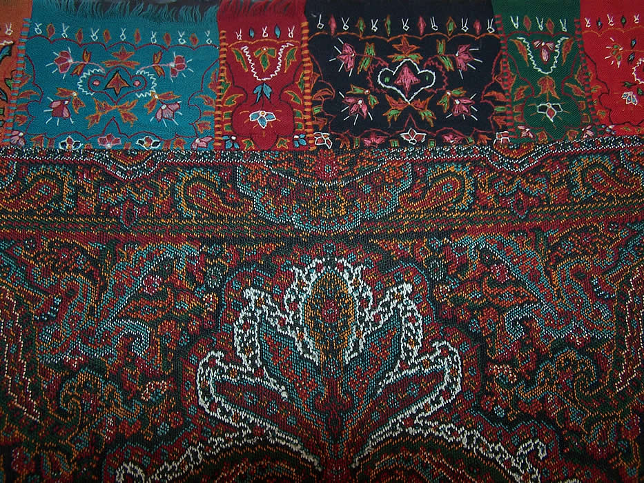 Antique Victorian Signed Kashmir Loomed Embroidered Pieced Paisley Shawl close up.