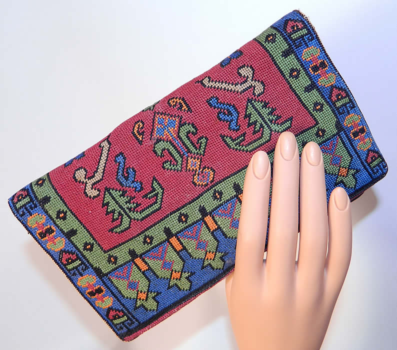 Vintage Oriental Rug Petit Point Needlepoint Embroidered Clutch Bag Purse. This pretty purse has a clutch envelope style, with a fold over flap snap closure, silk lined with an inside zipper pocket, mirror and attached coin purses. 