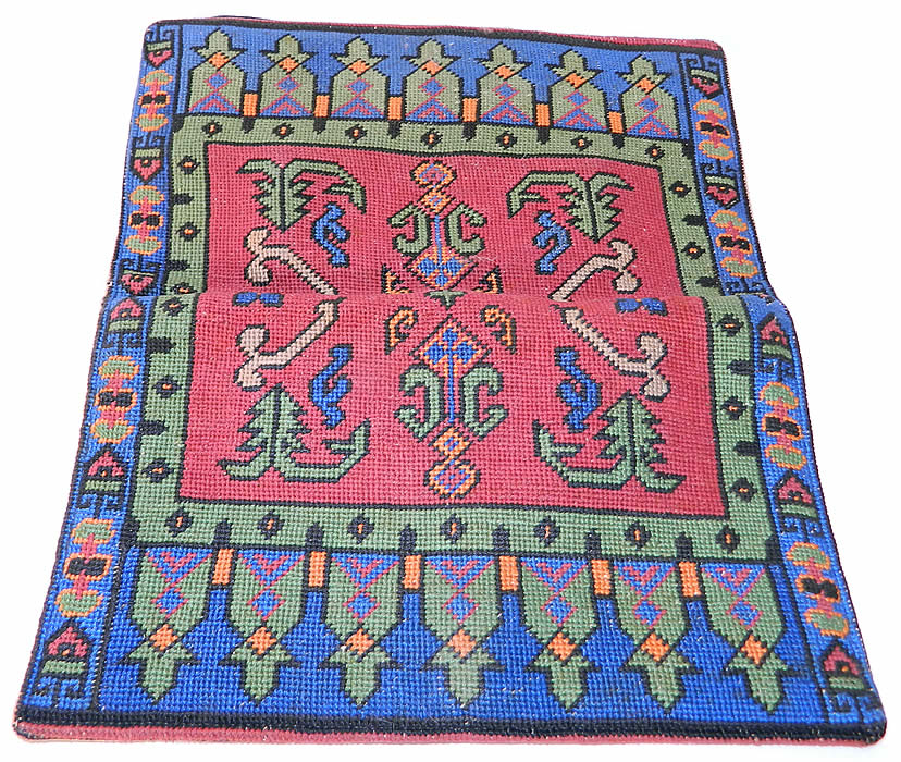 Vintage Oriental Rug Petit Point Needlepoint Embroidered Clutch Bag Purse. This vintage Oriental rug petit point needlepoint embroidered clutch bag purse dates from the 1930s.