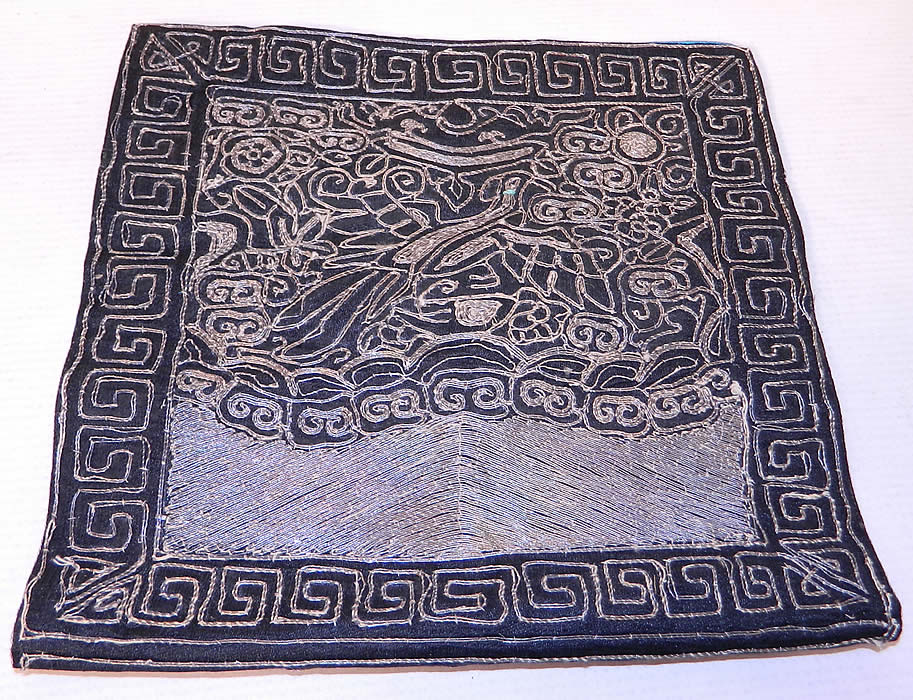 Antique Chinese Silver Couching Paradise Flycatcher Bird 9th Rank Badge Pair. There is a paradise flycatcher bird in the center, with clouds, a sun disk on the right for a female badge and waves of water embroidered on the bottom. The buzi badge is of the paradise flycatcher which is the symbol of the ninth civil rank badge. 