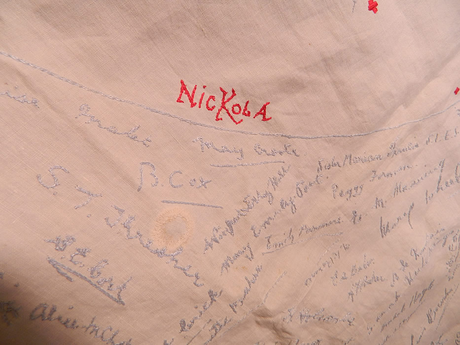 Vintage End of WWII Allies British Red Cross Signature Embroidered Linen Tablecloth. The tablecloth measures 52 by 55 inches. It is in good condition, has not been cleaned and has several faint age spots stains and a small mend patched repair 