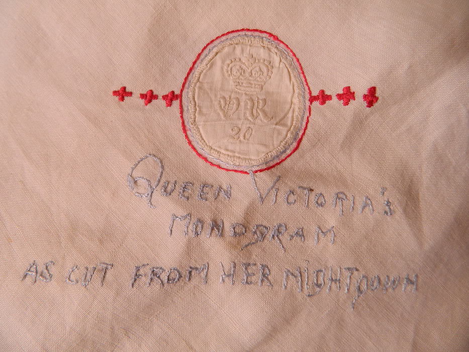 Vintage End of WWII Allies British Red Cross Signature Embroidered Linen Tablecloth. There is Queen Victoria's monogram cut from her nightgown and appliqued onto the tablecloth. 