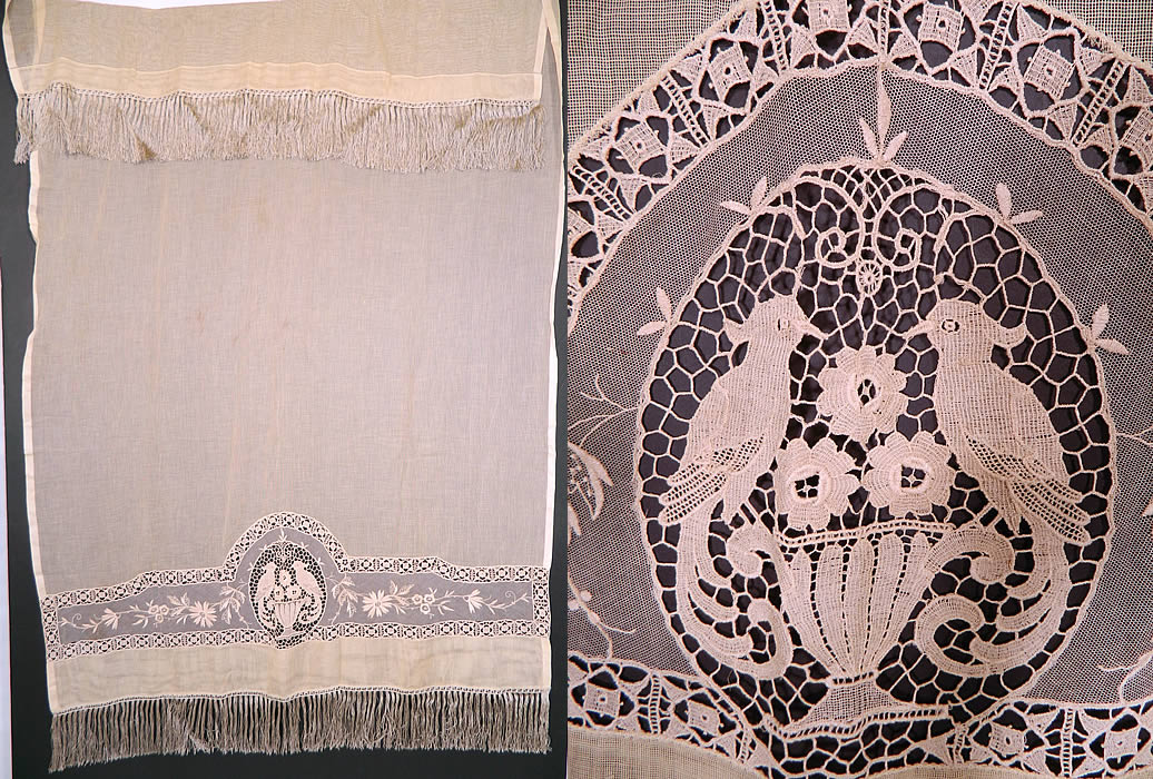 Victorian Antique Point de Venise Lace Floral Bird Net Fringe Drapery Curtain Panel. This Victorian era antique Point de Venise lace floral bird net fringe drapery curtain panel dates from 1900. It is made of an off white ecru cream color sheer cotton mesh net fabric, with a variety of needlework lace techniques.