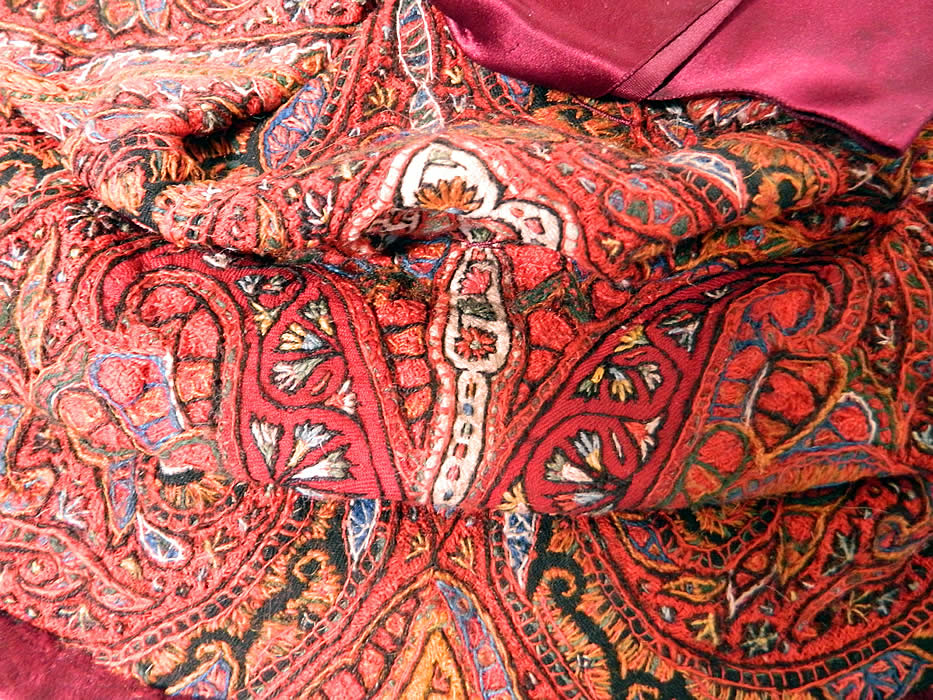 Antique Kashmir Hand Embroidered Woven Wool  Paisley Velvet Winter Muff. This wonderful winter muff hand warmer bag purse has open ends, fully lined inside and has a burgundy silk ribbon bow trim on top. 
