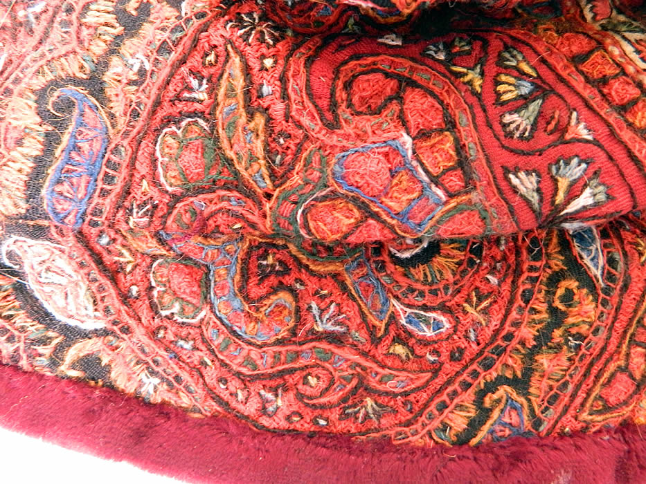 Antique Kashmir Hand Embroidered Woven Wool  Paisley Velvet Winter Muff. The muff measures 13 by 9 inches. It is in good condition. This is truly an exceptional unique one of a kind piece of  textile art!