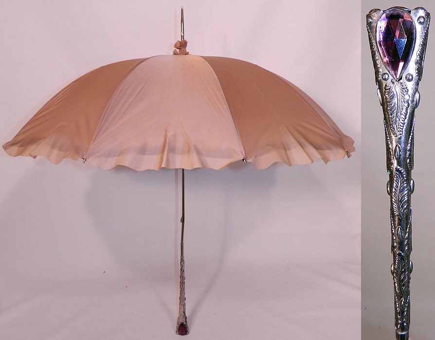 Vintage Ecru Nylon Abstract Print Amethyst Jeweled Silver Handle Parasol Umbrella. This vintage ecru nylon abstract print amethyst jeweled silver handle parasol umbrella dates from the 1950s. It is made of an ecru cream color nylon fabric, with an abstract decorative puffy cloud print design inside. 