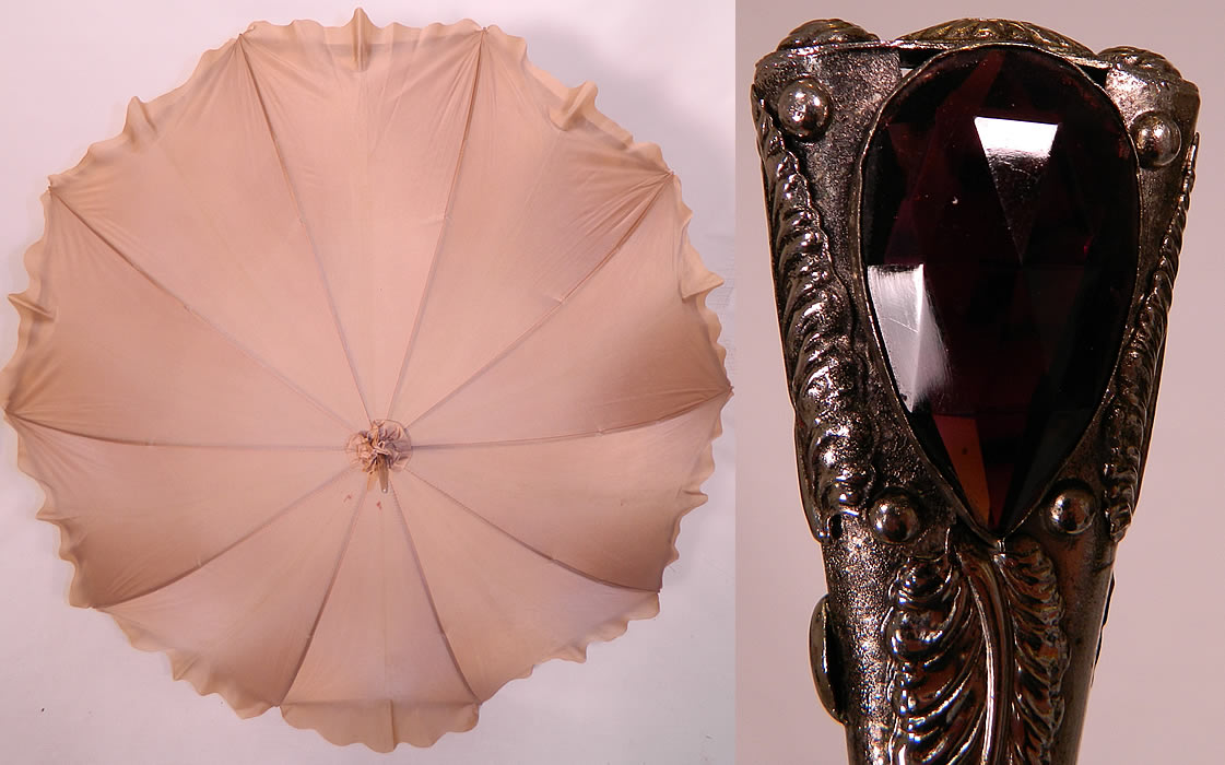 Vintage Ecru Nylon Abstract Print Amethyst Jeweled Silver Handle Parasol Umbrella. There is an ornate silver metal pewter stick handle with a repousse raised leaf design set with 2 large faceted jeweled amethyst purple color glass stones on each side of the handle base and a metal tip finial top. 
