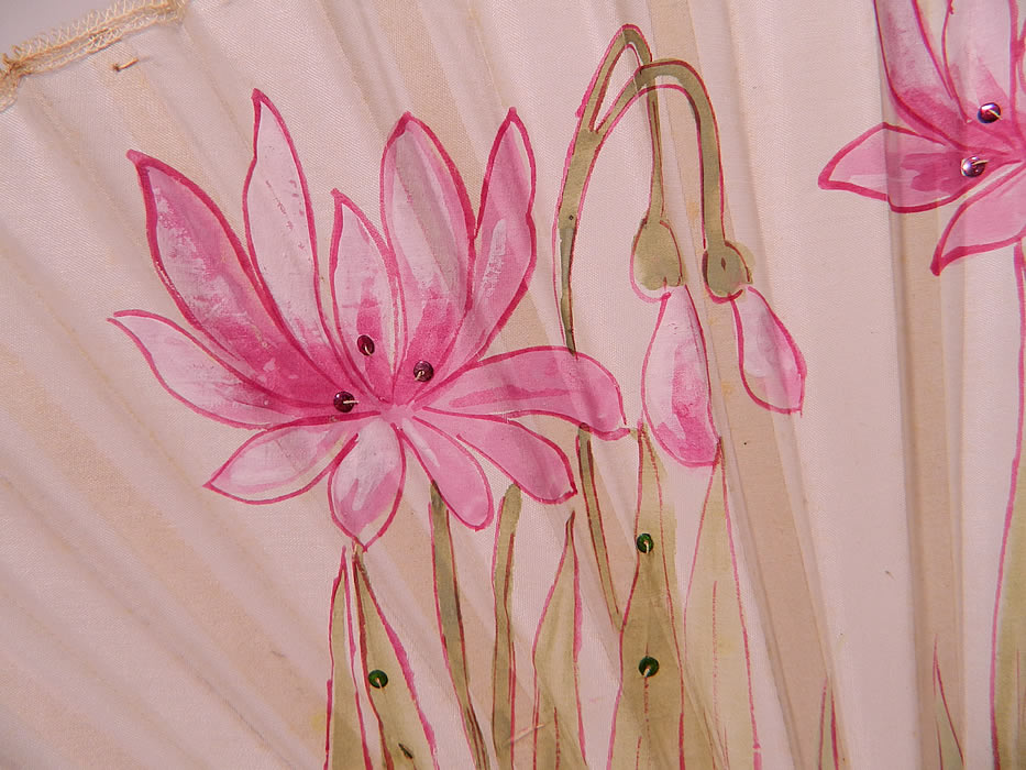 Art Nouveau Japonism Hand Painted Flower Sequin Silk Pleated Folding Fan. It is made of a pleated white silk fabric, white wooden sticks, guards, pink hand painted Japanese art style flowers and tiny pink, green sequin accents. 