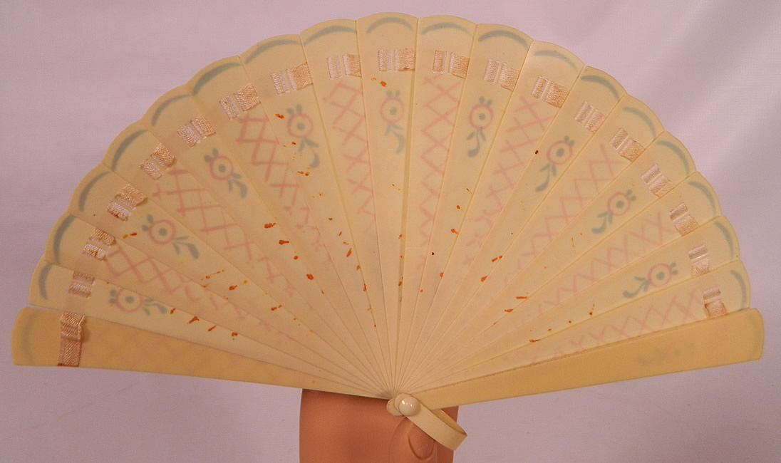 Vintage Art Deco  Hand Painted Celluloid Small Brise Dance Flapper Fan. It is made of celluloid sticks, with hand painted teal, orange floral, lattice designs on the front. 