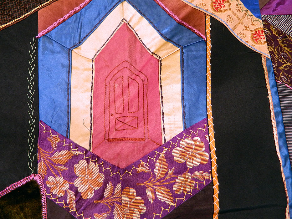 Victorian Antique Silk Embroidered Fancy Needlework Applique Crazy Quilt 
There is an iridescent green silk fabric backing with red trim binding edging. 
