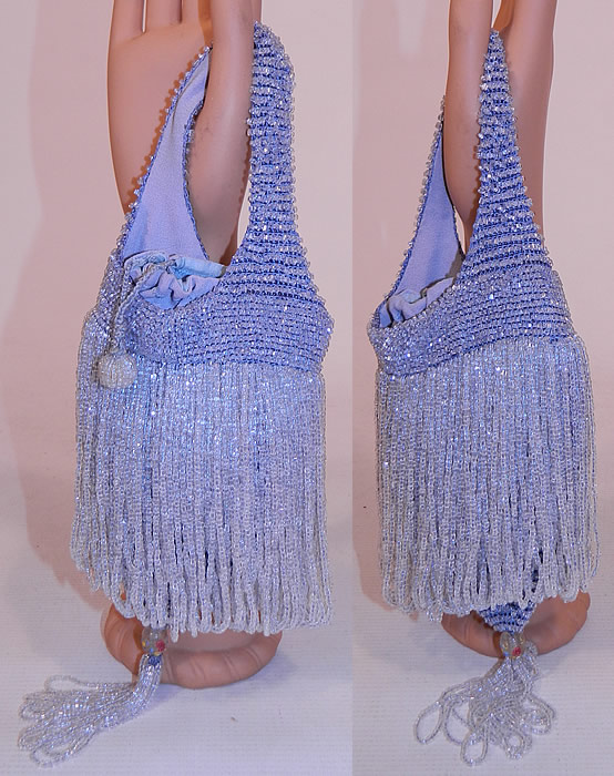Vintage Periwinkle Blue Crystal Beaded Loop Fringe Tassel Drawstring Flapper Purse
This vintage periwinkle blue crystal beaded loop fringe tassel drawstring flapper purse dates from the roaring 1920s. It is hand beaded with a periwinkle blue crystal beads done in a loop fringe layered design on a blue knit fabric. 