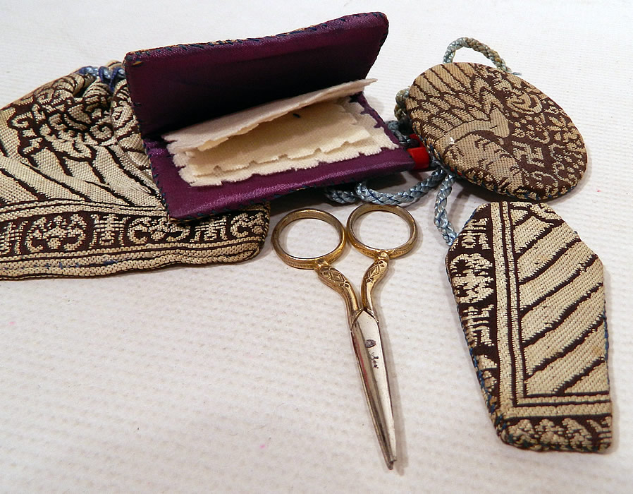 Antique Chinese Woven Silk Sewing Etui Scissors Pouch Needle Case Chatelaine
It measures 22 inches long and is in good condition. This is truly a beautiful one of a kind piece of antique Chinese sewing textile art