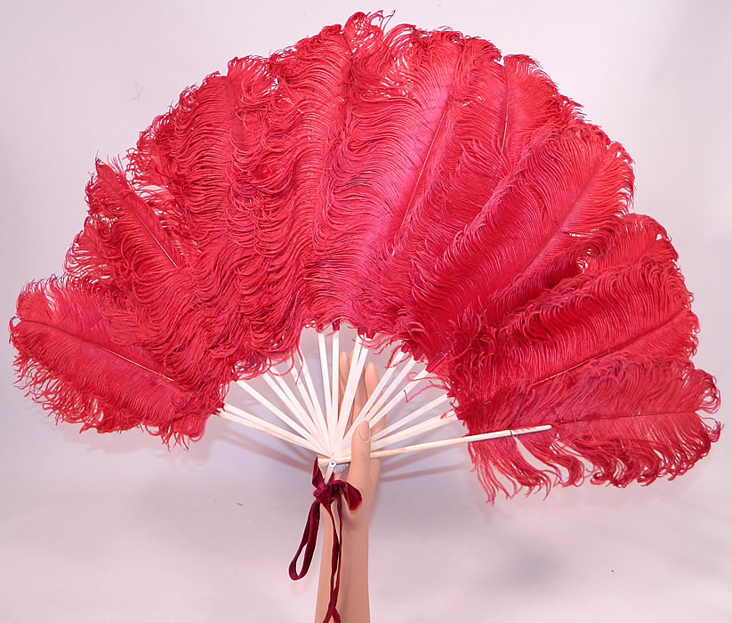 Antique Edwardian Red Ostrich Feather Folding Fan Velvet Ribbon
This antique Edwardian era red ostrich feather folding fan and velvet ribbon dates from 1910.