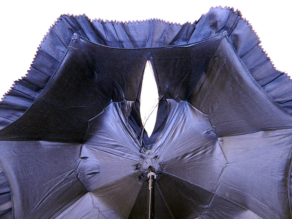 Victorian Civil War Black Silk Ebony Folding Handle Marquis Mourning Parasol
It is in as-is fair condition, with a large split rip on the outer fabric and a few small splits on the inside silk lining (see close-ups). This is still a wonderful antique Victoriana mourning parasol!