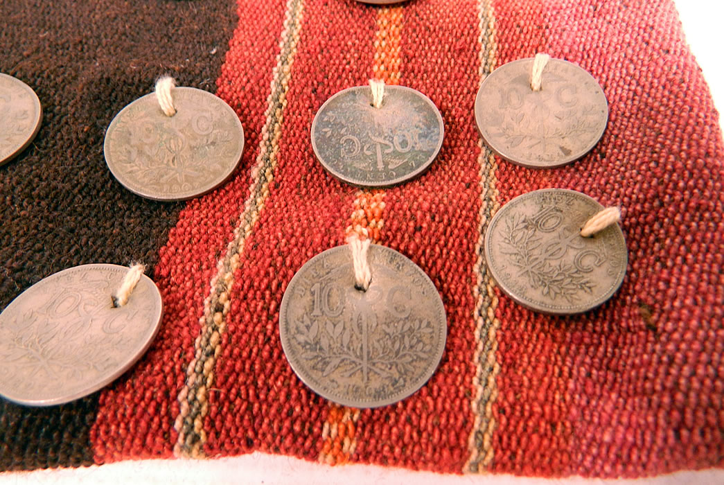 Antique Bolivia Silver Coin Chuspa Coca Woven Weave Bag
There are 20 silver coins from Bolivia dating from 1902 to 1972 sewn onto the front for decoration. 