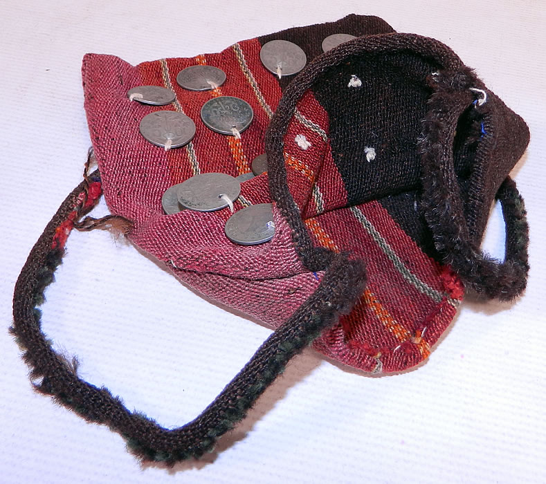 Antique Bolivia Silver Coin Chuspa Coca Woven Weave Bag
These unique chuspa small bags were often made from leftover weaving pieces and held dry cocoa leaf and coins. 