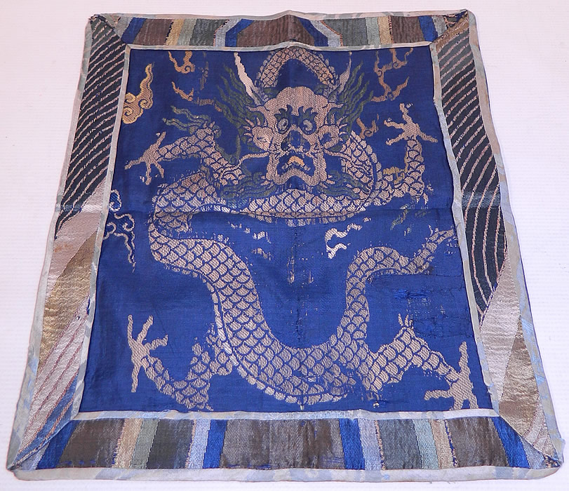 Antique Chinese Silk Damask Weave Brocade Fabric Mangpao Dragon Square Badge Textile
This antique Chinese silk damask weave brocade fabric Mangpao dragon square badge textile dates from the early 19th century during the Qing Dynasty.